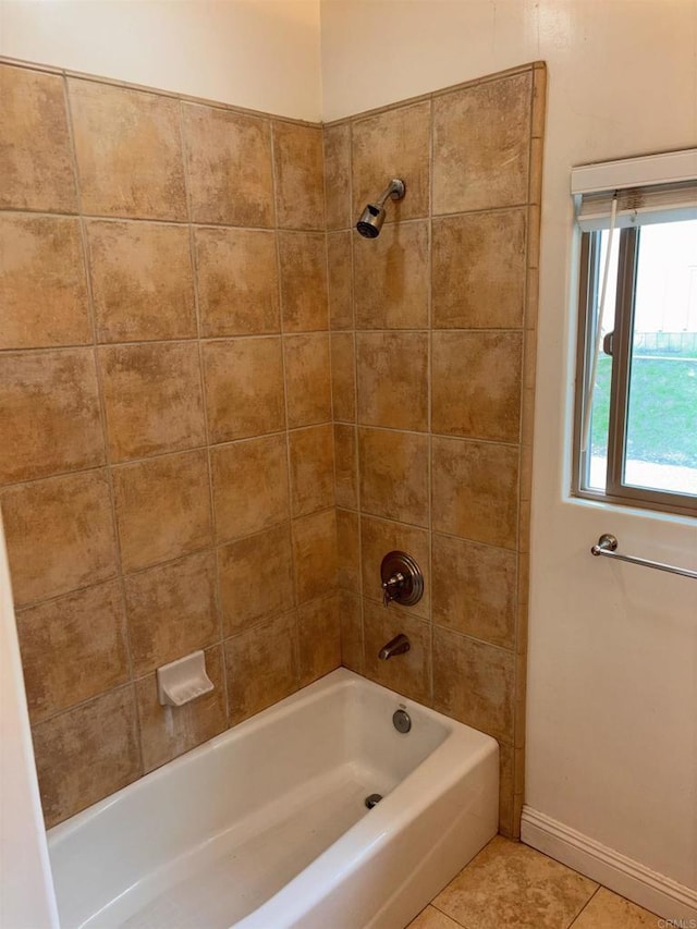 full bath with bathtub / shower combination, baseboards, and tile patterned floors