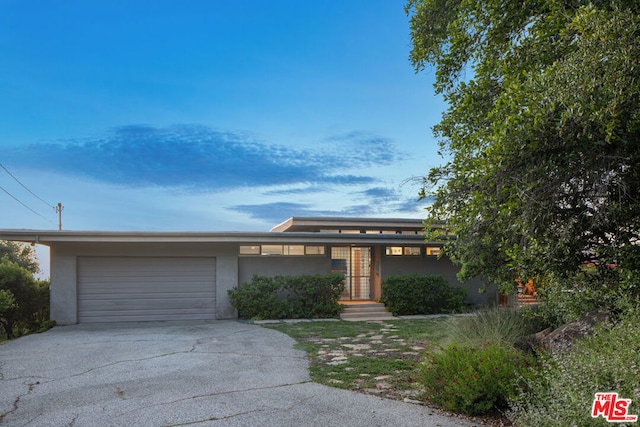 view of front of home featuring a garage