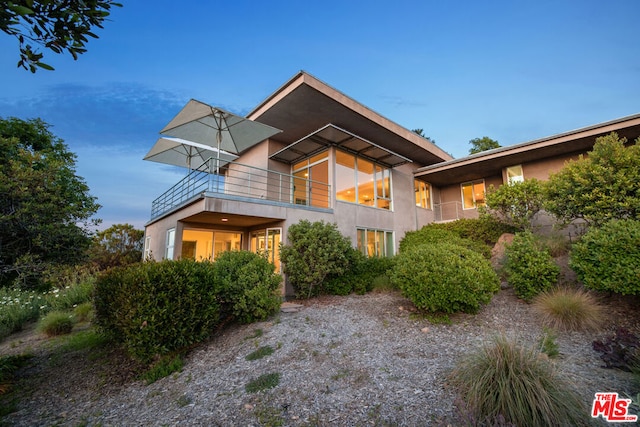 contemporary house with a balcony