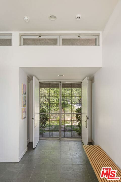 entryway featuring a wall of windows