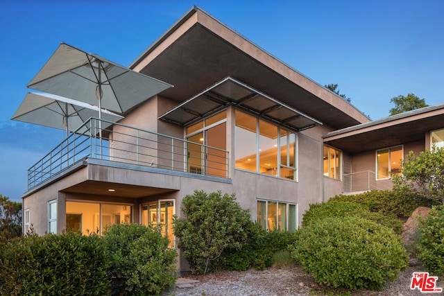 exterior space with a balcony