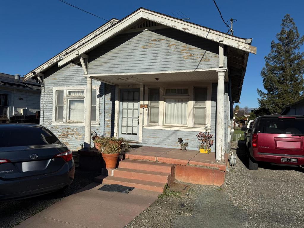 bungalow-style home with covered porch