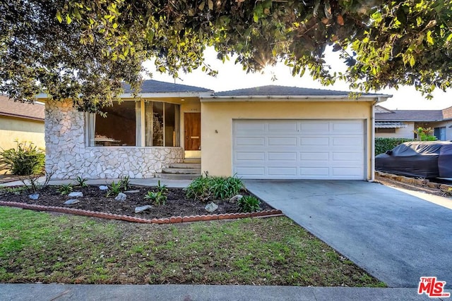 single story home with a garage