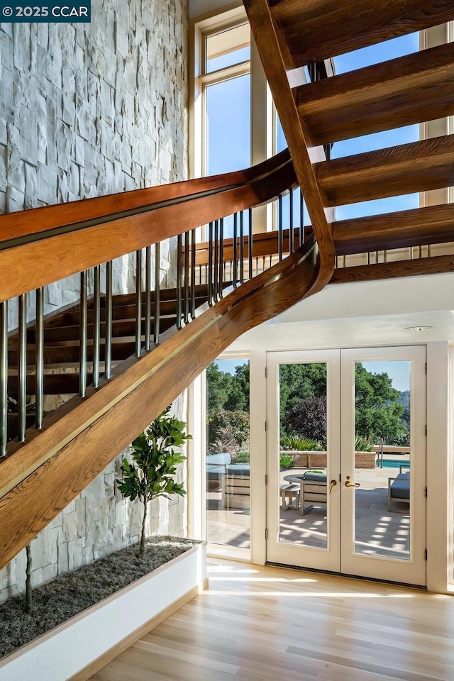 interior space featuring french doors and wood-type flooring