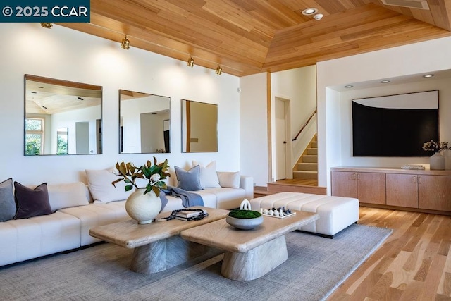 living room with high vaulted ceiling, wooden ceiling, and light wood-type flooring