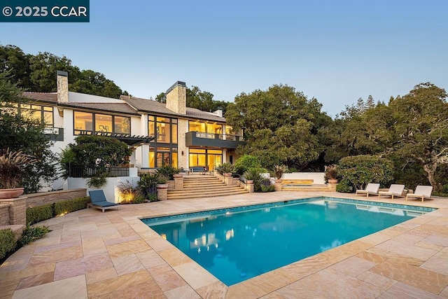 view of pool with a patio