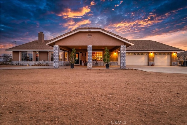 ranch-style home with a garage