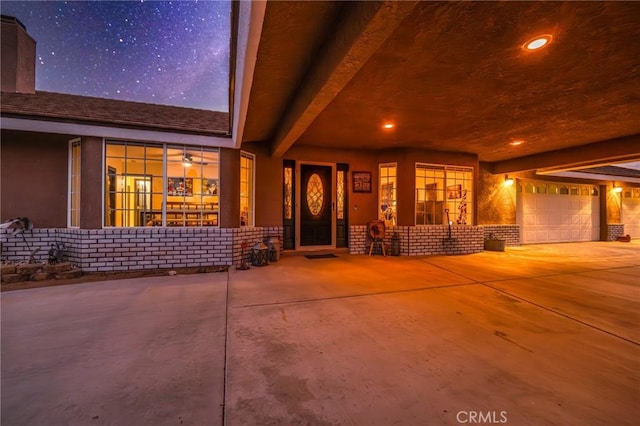 property entrance with a garage