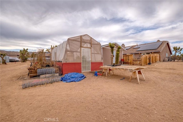 exterior space with an outbuilding