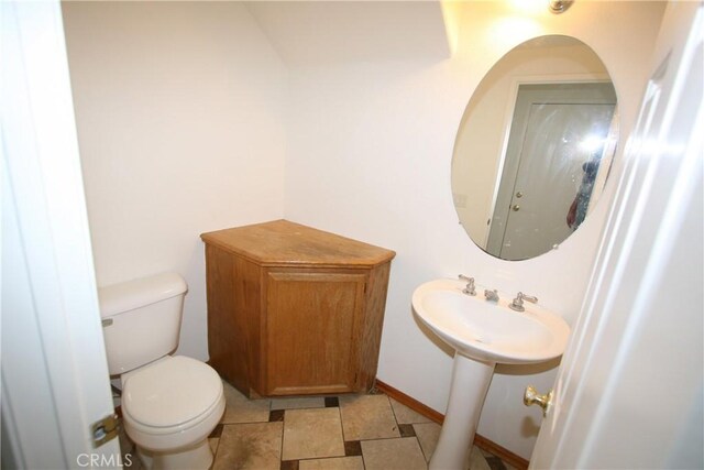 bathroom featuring toilet