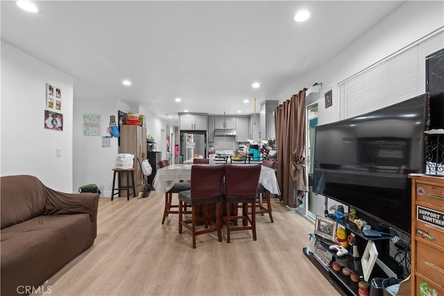 dining room with light hardwood / wood-style flooring