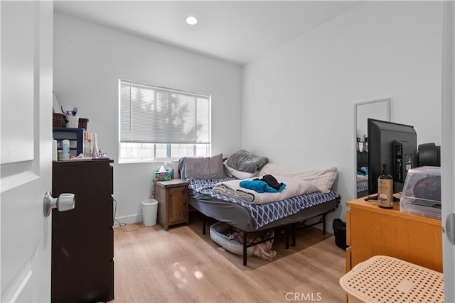 bedroom featuring light hardwood / wood-style floors