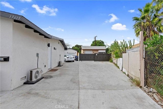 exterior space with ac unit