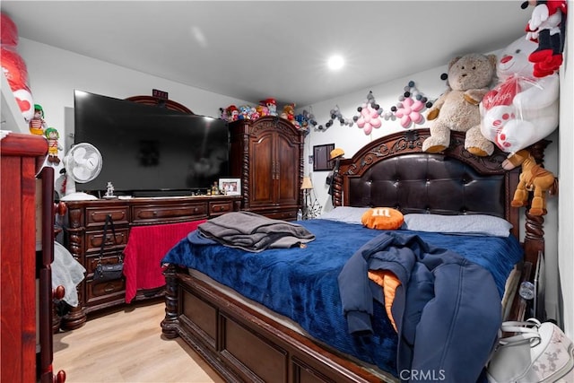 bedroom featuring light hardwood / wood-style floors