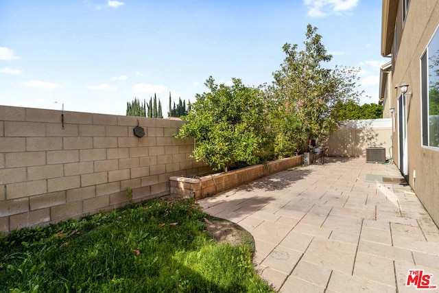 view of patio with central air condition unit