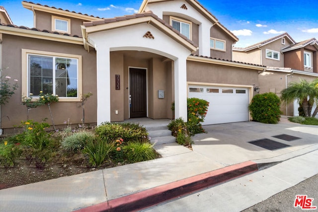 view of front of home featuring a garage