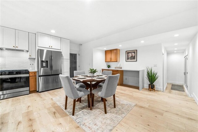 dining room featuring light wood-type flooring