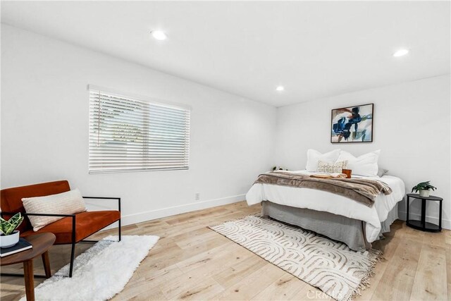 bedroom featuring light hardwood / wood-style floors