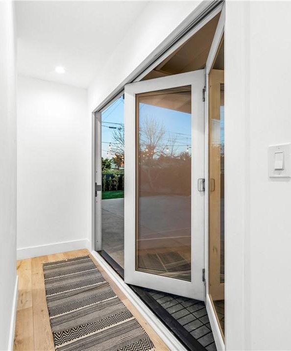 entryway featuring wood-type flooring