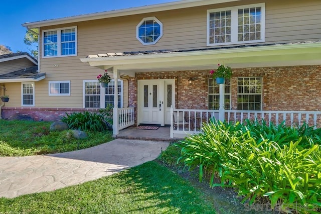 view of front of home featuring covered porch