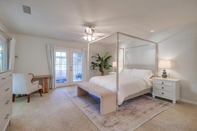 bedroom with access to exterior, french doors, and ceiling fan