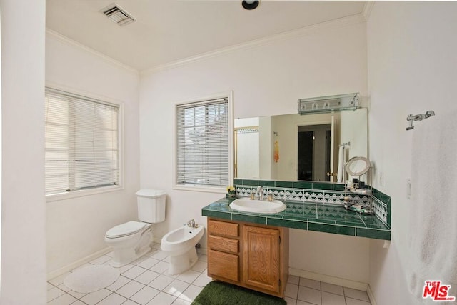 bathroom featuring tile patterned flooring, crown molding, backsplash, toilet, and a bidet