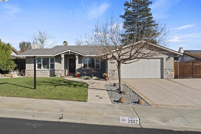 ranch-style house featuring a garage and a front yard