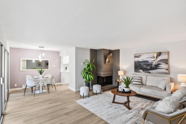 living room with light hardwood / wood-style floors