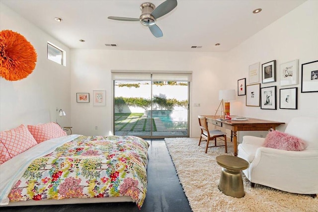 bedroom featuring access to exterior, ceiling fan, and multiple windows