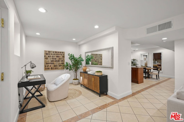 interior space featuring light tile patterned floors