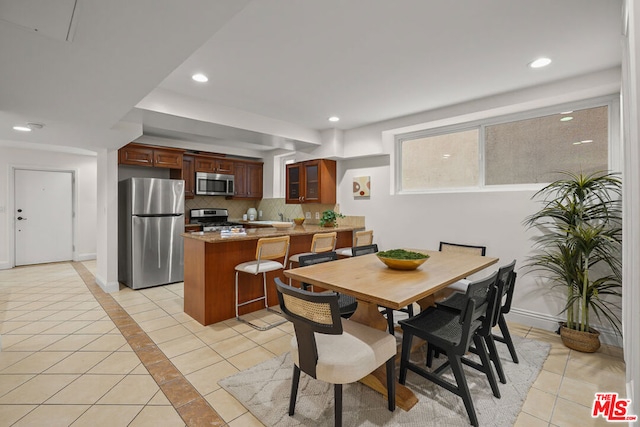 view of tiled dining space