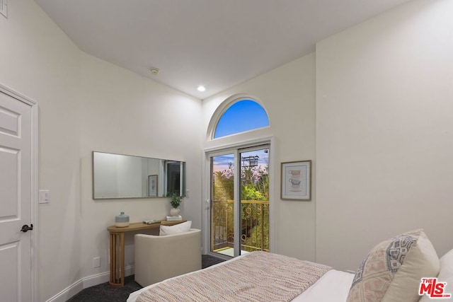 bedroom featuring carpet and access to outside