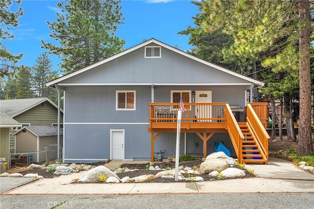 view of front of house with a deck