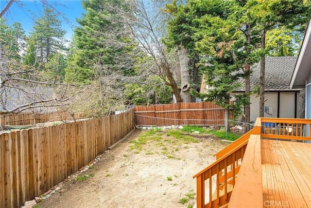 view of yard featuring a deck