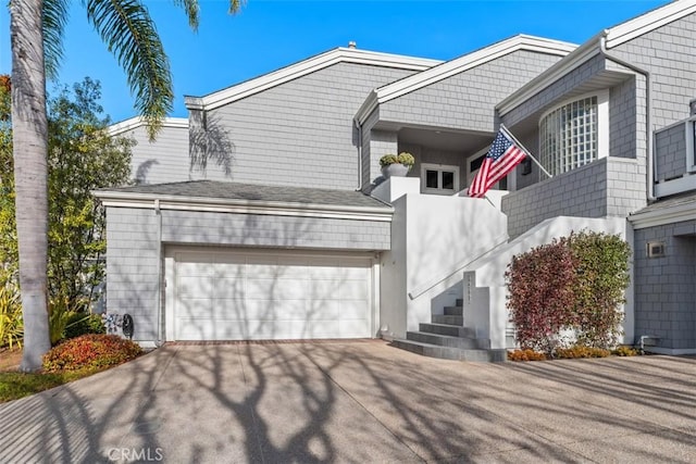 view of side of property with a garage