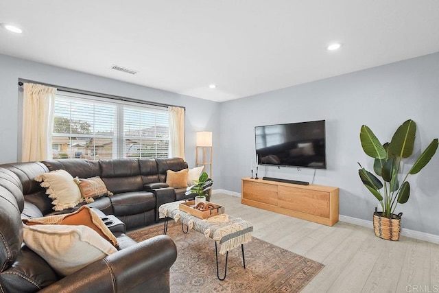 living room featuring light wood-type flooring