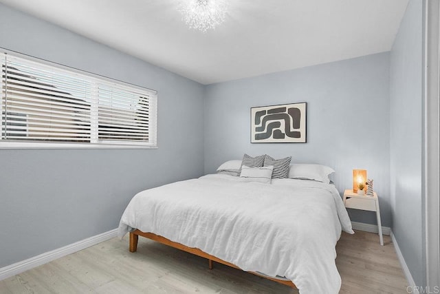 bedroom featuring light hardwood / wood-style flooring