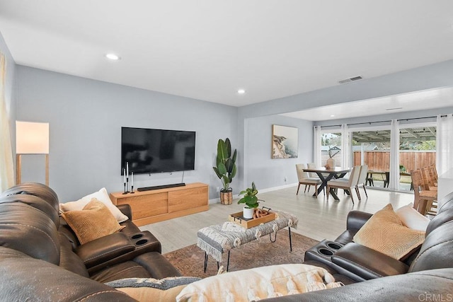 living room featuring light wood-type flooring