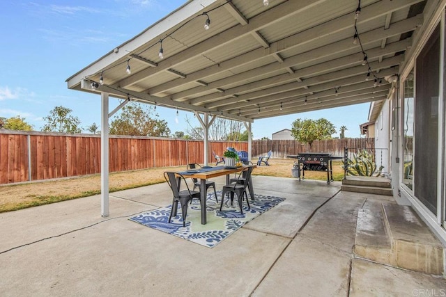 view of patio with a grill