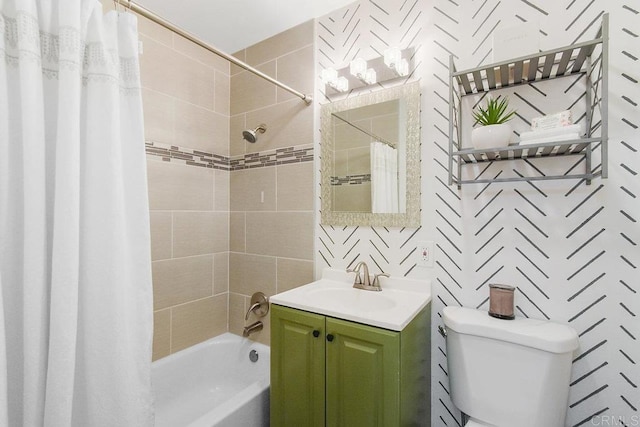 full bathroom featuring vanity, toilet, and shower / tub combo