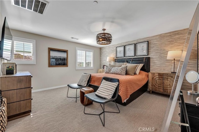 bedroom with light carpet