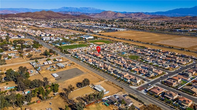 bird's eye view with a mountain view