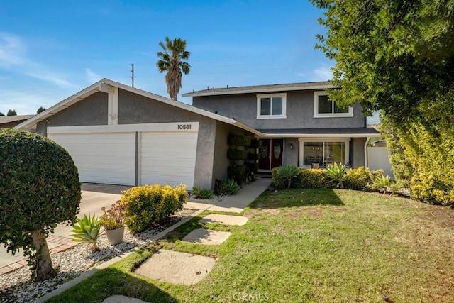 front facade with a garage and a front lawn