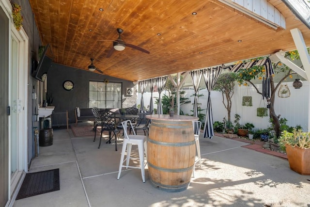 view of patio / terrace featuring ceiling fan