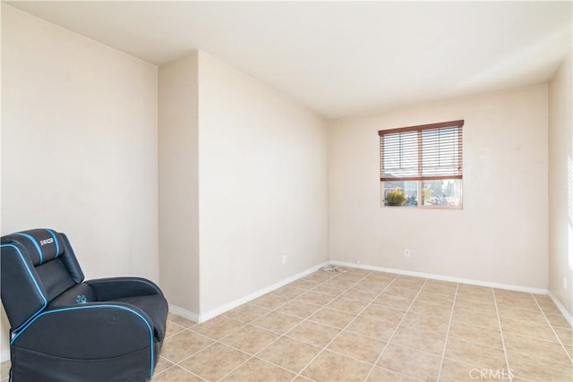 sitting room with light tile patterned flooring