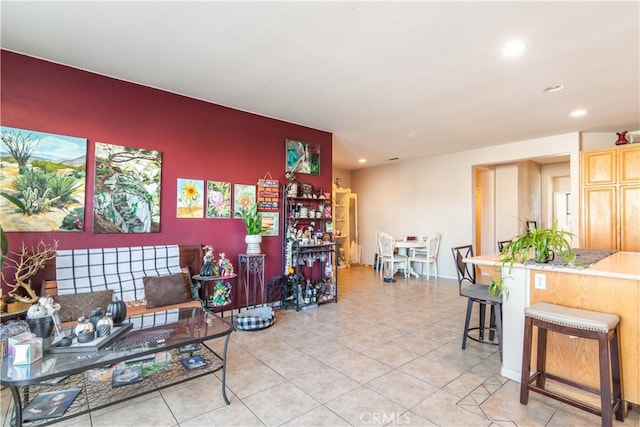 living room with tile patterned flooring