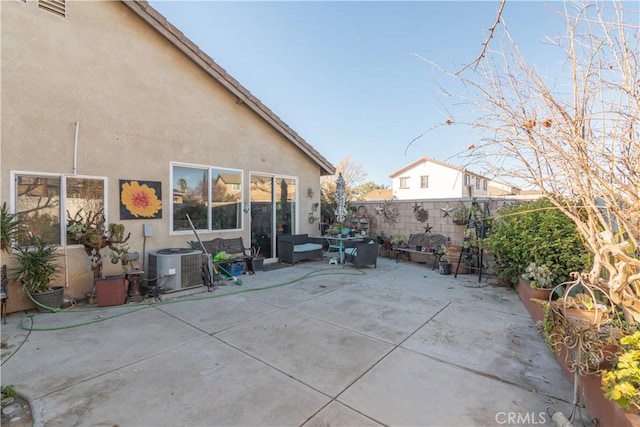 view of patio with central AC unit