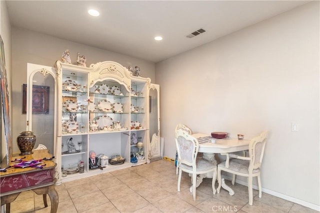 view of tiled dining space