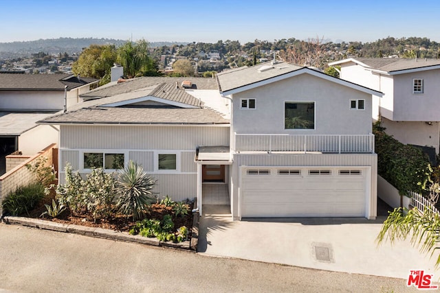 view of front of property featuring a garage