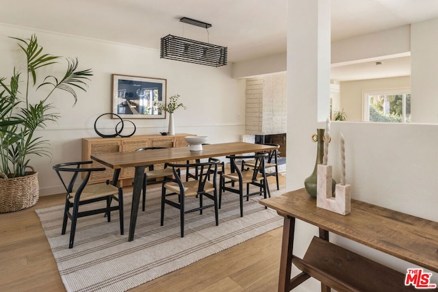 dining space featuring light hardwood / wood-style floors